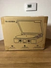 New Tanlanin 3-SPEED Bluetooth Vinyl Record Player W/ Built-in Speakers. Price: $60.00.